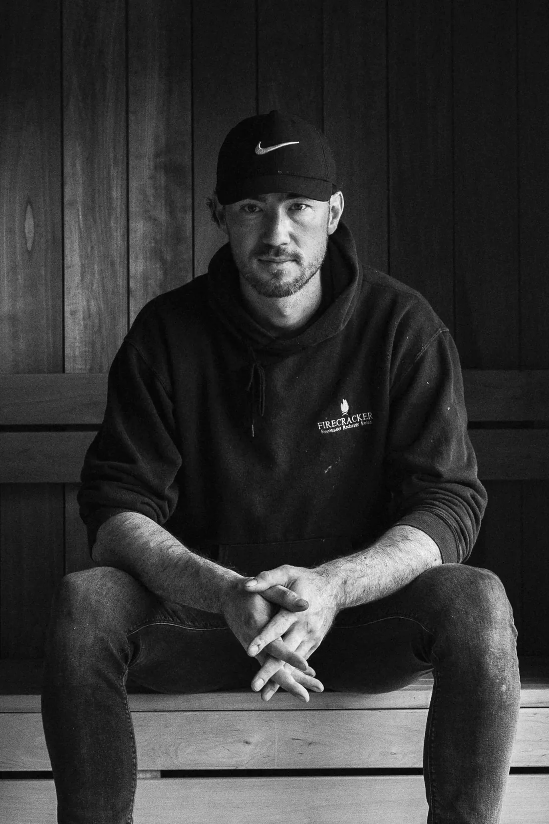 Enda Macken, founder of Firecracker, on the bench inside the sauna